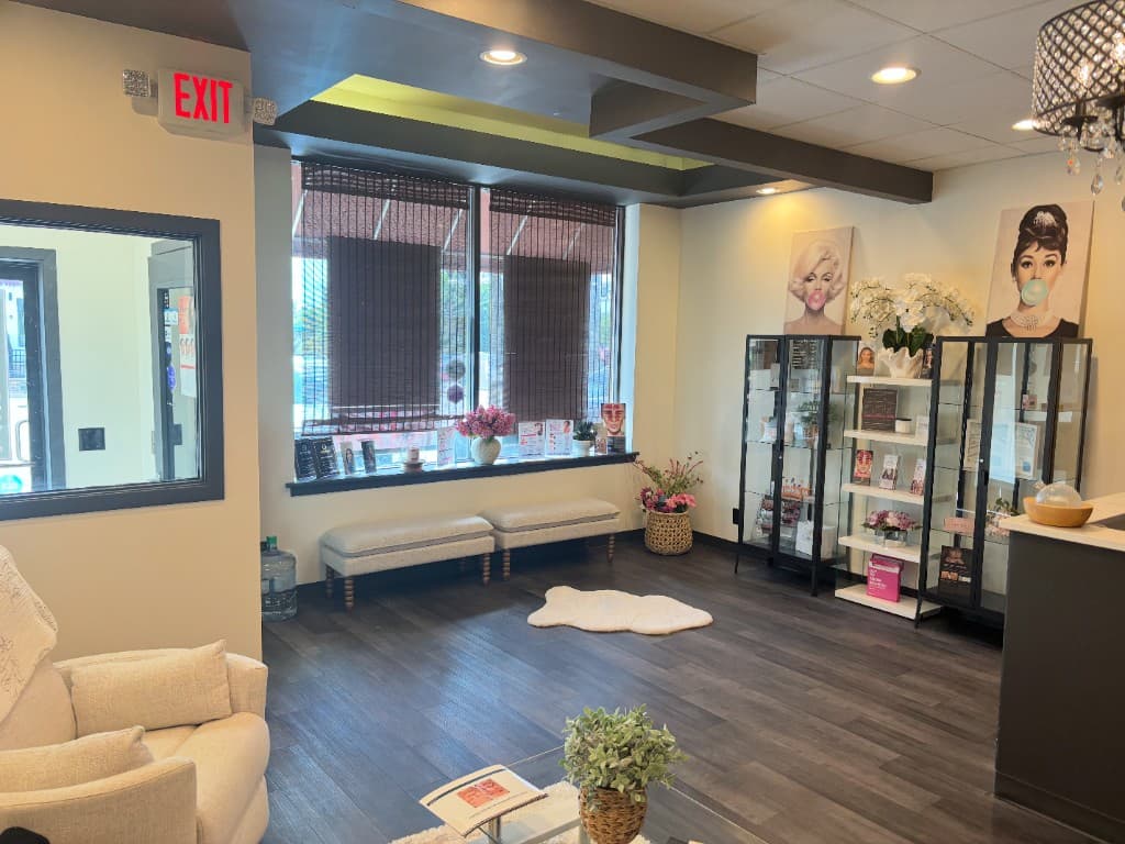 Hello Gorgeous retail wall with medical-grade skincare and awards