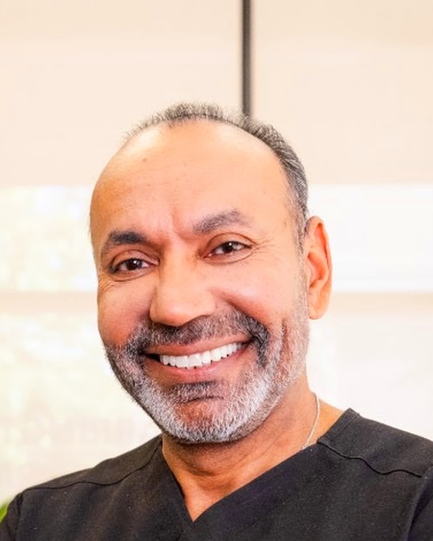 Dr. Mukesh Arora, MD, Medical Director at Hello Gorgeous Med Spa
